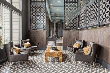 Gaming lounge with billiards, foosball, shuffleboard, and vintage arcade games
